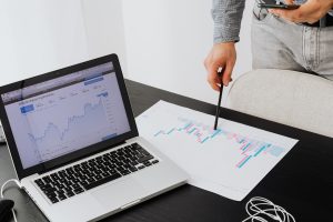Man presenting remote work data to boss